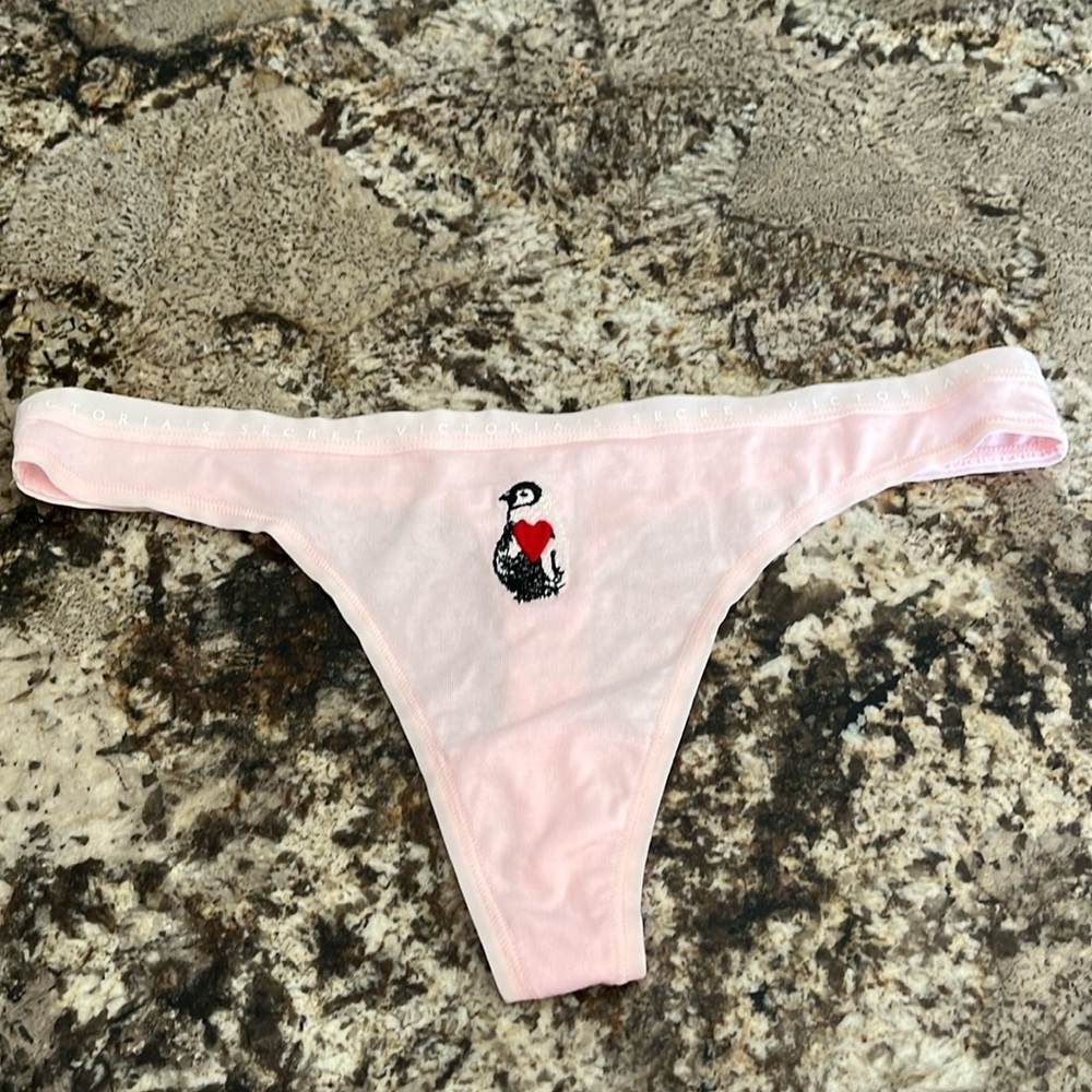 Victoria’s Secret light pink thongs, size M, NWOT, never worn.